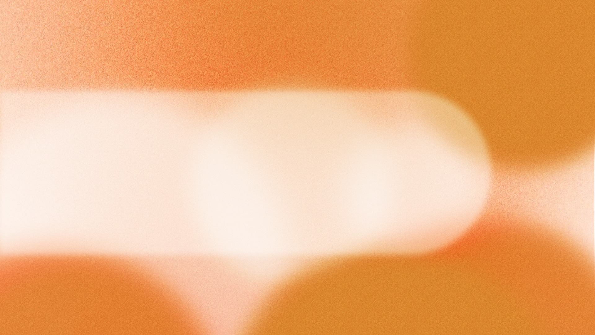 Abstract orange grainy gradient background